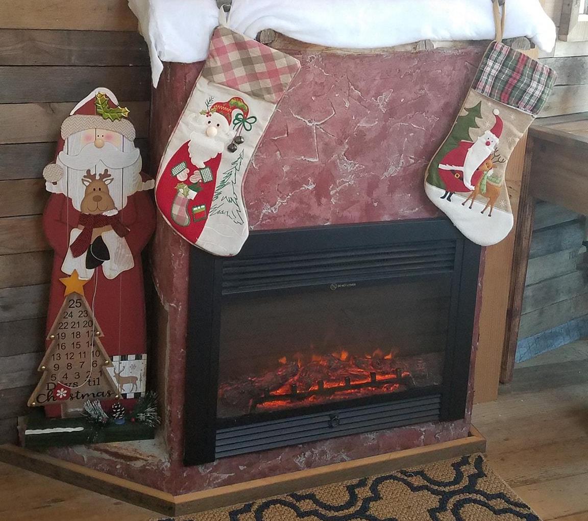 Kottage Knection fireplace with stockings.